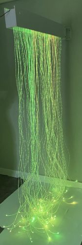 Image of Fibre Optic Curtain lit up in green