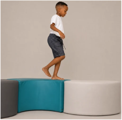 Image of a child walking on a circle set s-curve