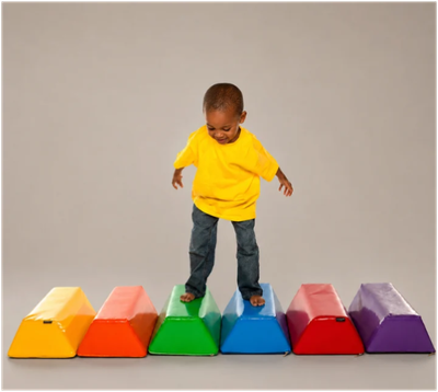 Image of child standing on stepping stones set laid out in a row