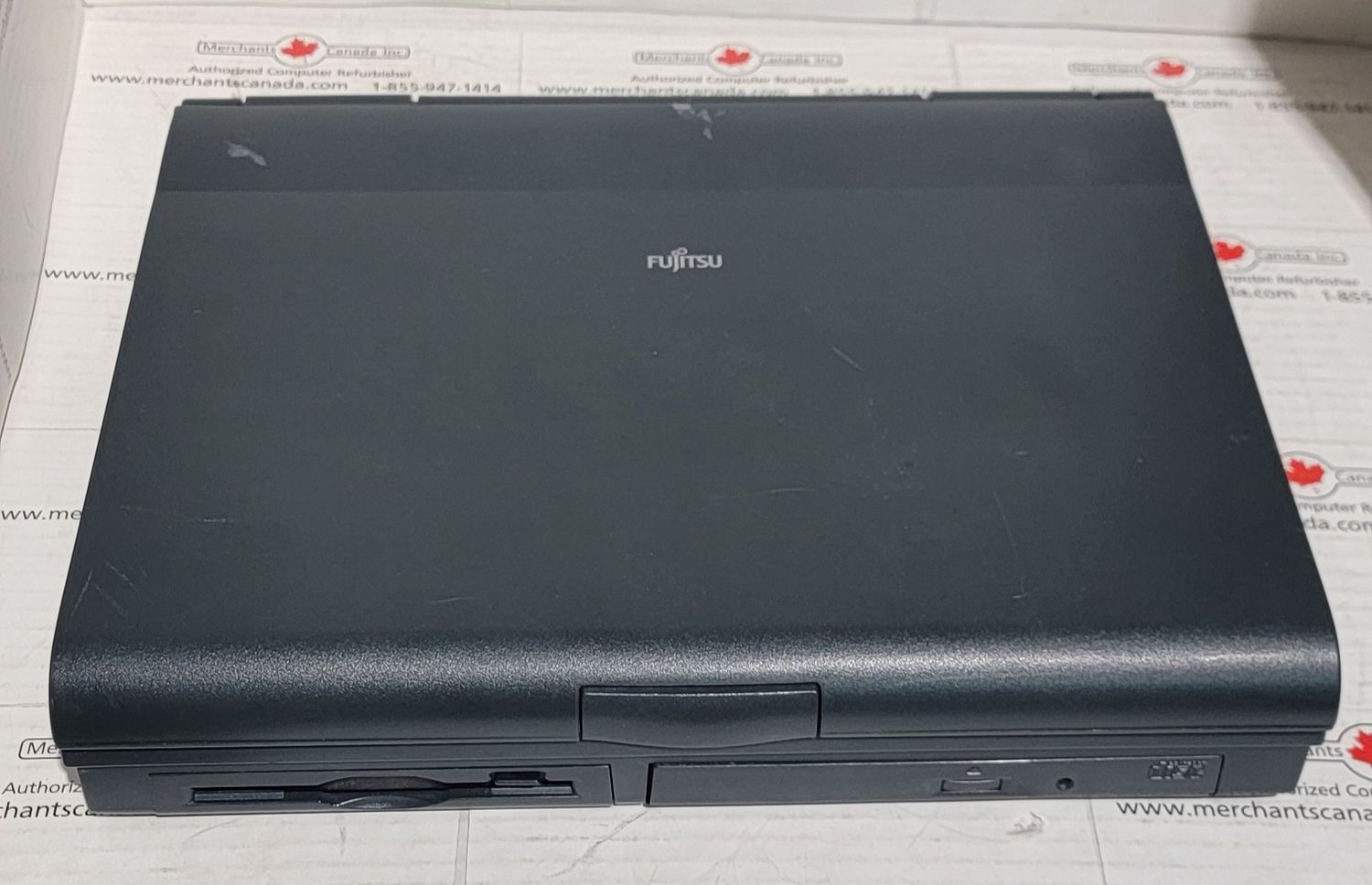 FUJITSU LIFEBOOK 765DX Intel Pentium MMX 166 – 16MB, 2GB, 12.1", PS2, FDD, PCMCIA