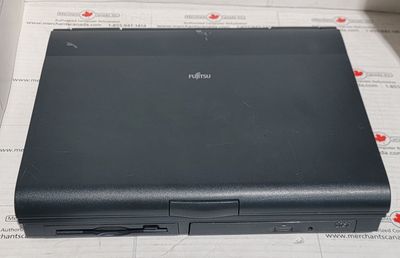 FUJITSU LIFEBOOK 765DX Intel Pentium MMX 166 – 16MB, 2GB, 12.1", PS2, FDD, PCMCIA