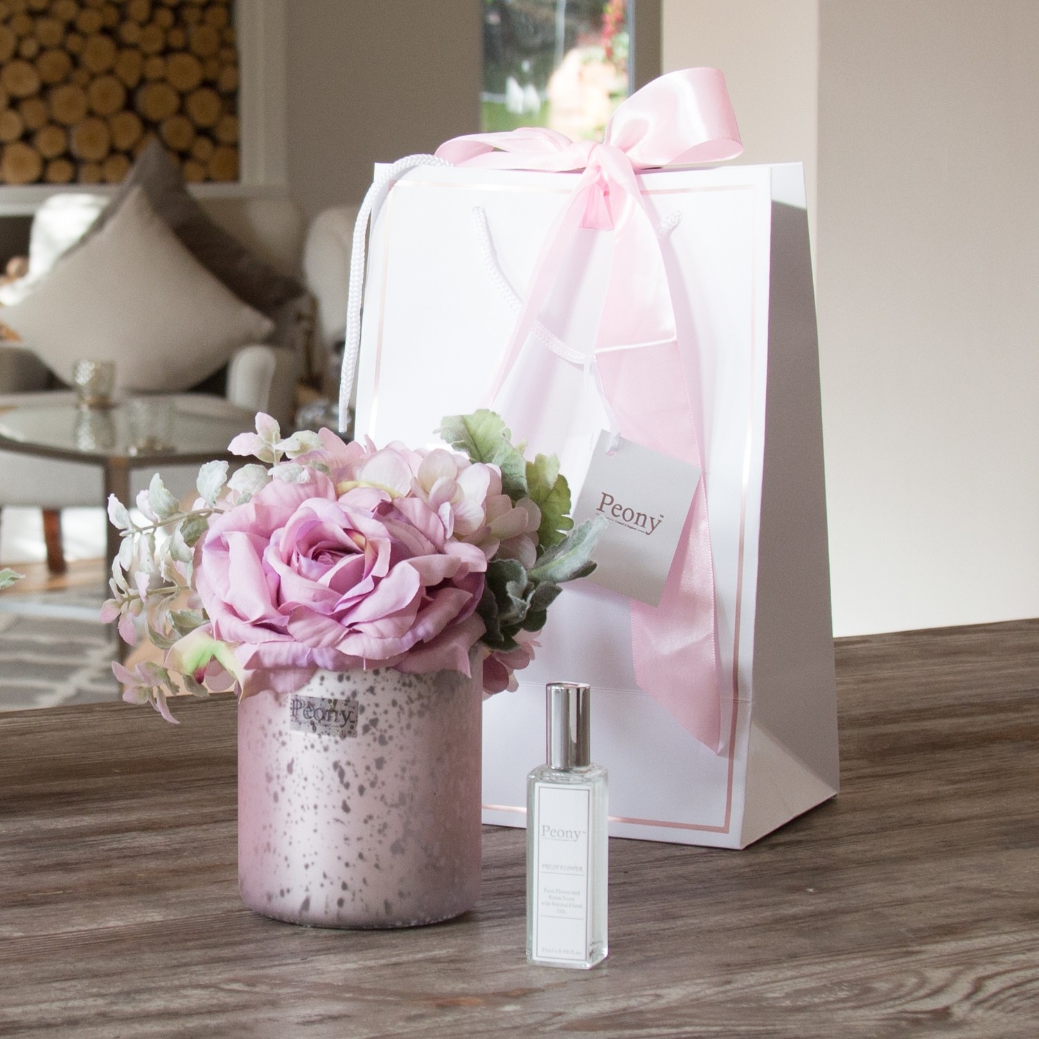 Rose, Hydrangea and Foliage in a pink Mercury vase Rose, Hydrangea and Foliage in a pink Mercury vase