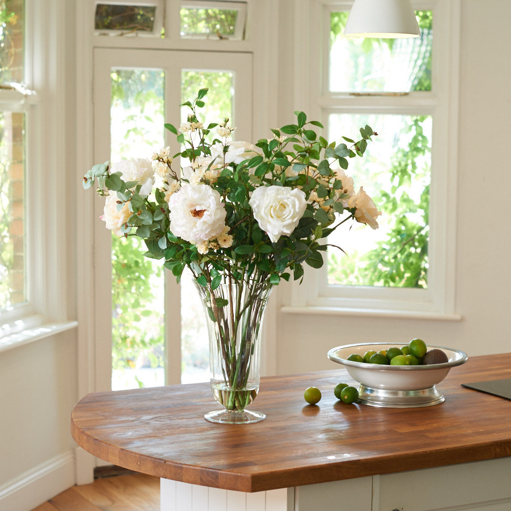 Roses, Peonies & Eucalyptus in an Optic Trunk Vase Roses, Peonies & Eucalyptus in an Optic Trunk Vase