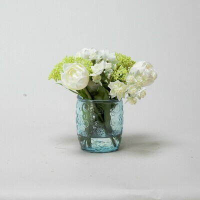 White Tulips and Astrantia in a textured blue beaker vase White Tulips and Astrantia in a textured blue beaker vase