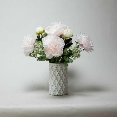 Peonies and Achillea in a diamond textured vase Peonies and Achillea in a diamond textured vase