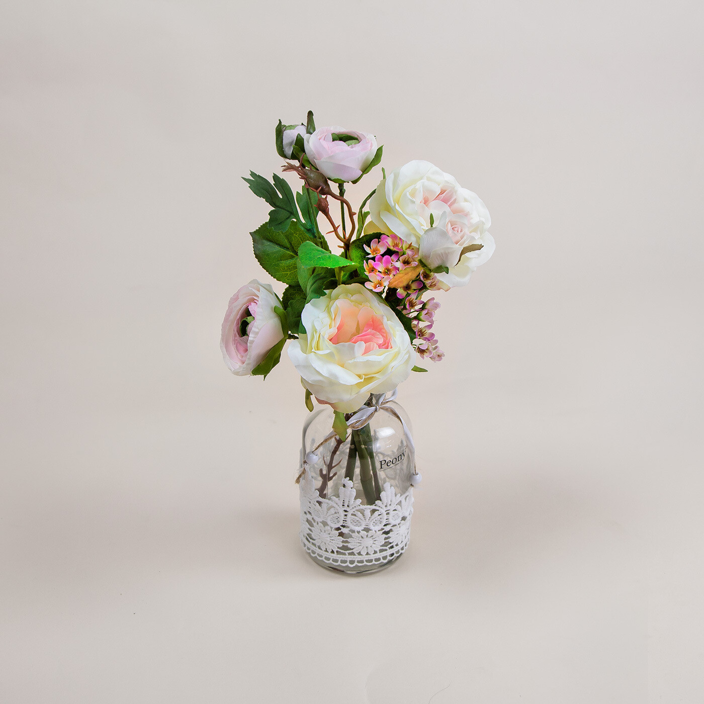 Rose, Ranuncula and Waxflower in a Lace Bottle Vase Rose, Ranuncula and Waxflower in a Lace Bottle Vase