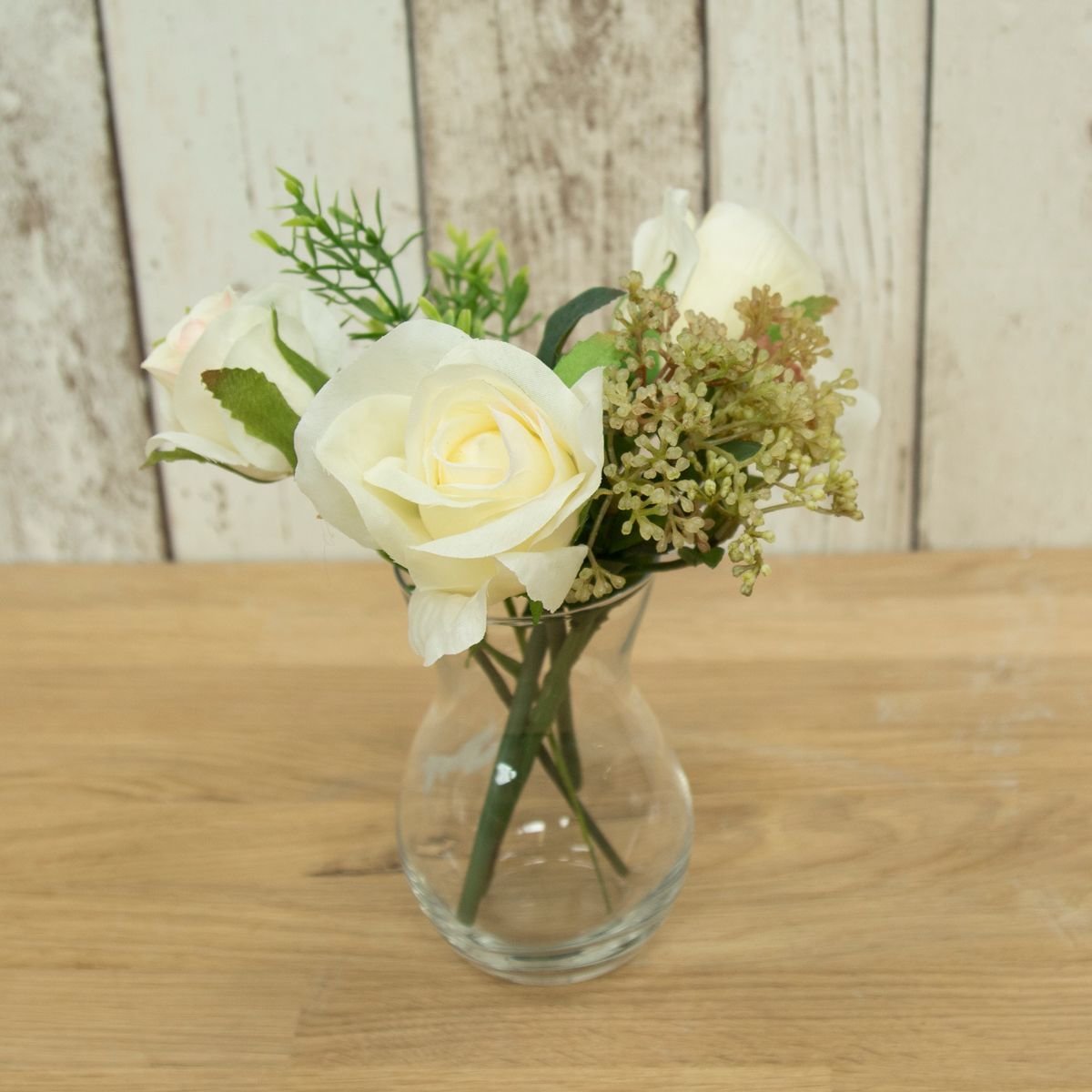 Artificial Roses and Foliage in a Pristina vase- Cream/Green Artificial Roses and Foliage in a Pristina vase- Cream/Green