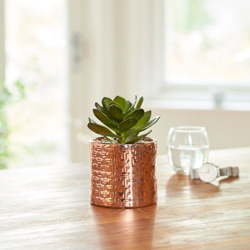 Artificial succulent in a round copper pot- Green Artificial succulent in a round copper pot- Green