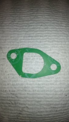Insulator To Head Gasket (carb)