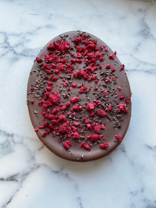 Milk Chocolate Egg with Cacao nibs and Raspberry