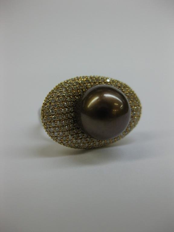 ANILLO DE ORO CON DIAMANTES Y PERLA