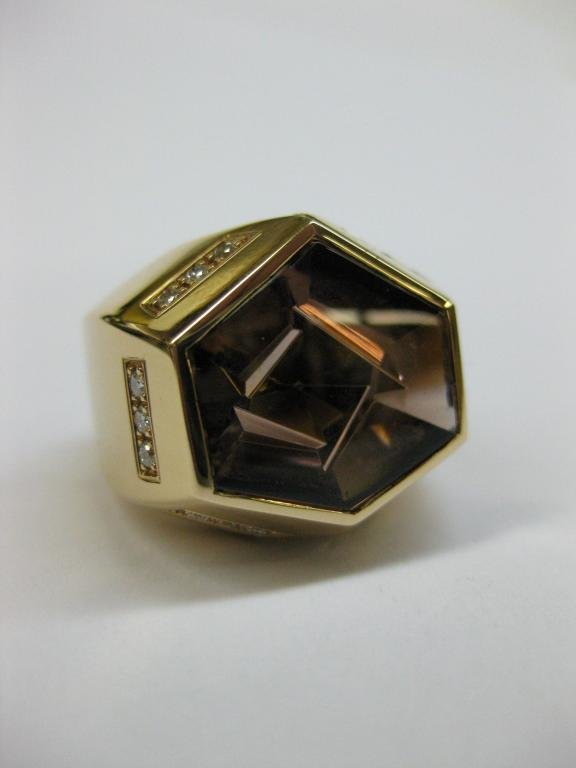 ANILLO DE ORO ROSA CON TURMALINA Y DIAMANTES.