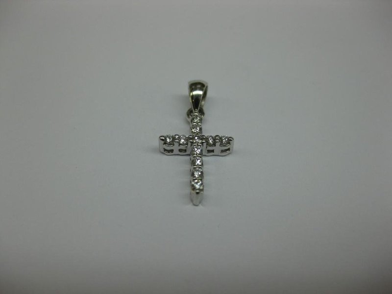 CRUZ DE ORO BLANCO Y DIAMANTES.