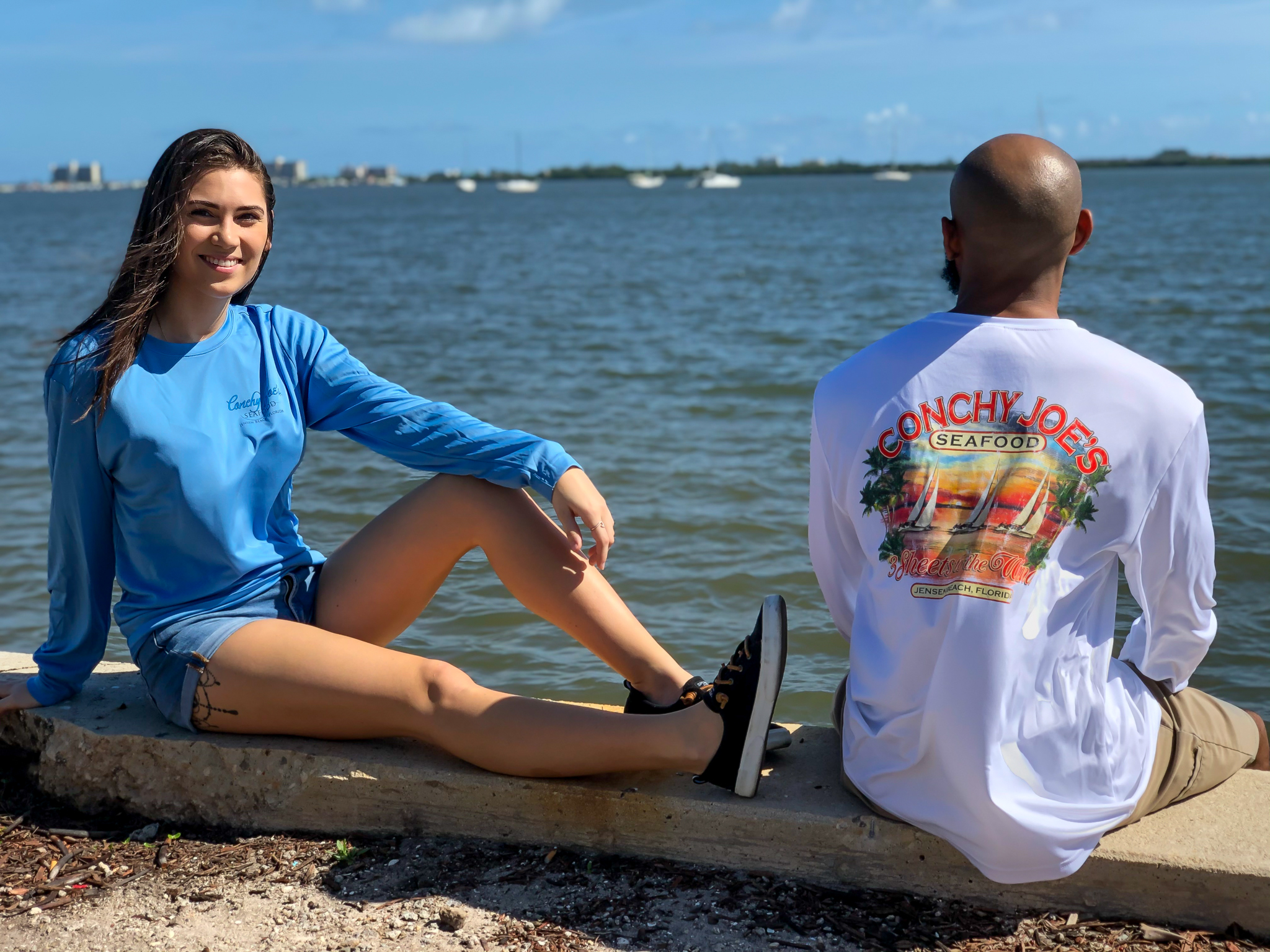 Female Model: Front of our 3 Fish Long Sleeve
Male Model: Back of our 3 Sheets to the Wind Long Sleeve