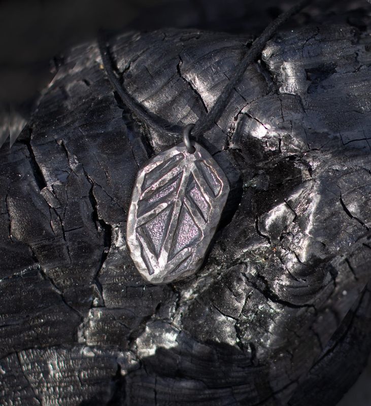 Tietäjien tulet-vuosiamuletti