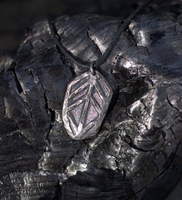Tietäjien tulet-vuosiamuletti