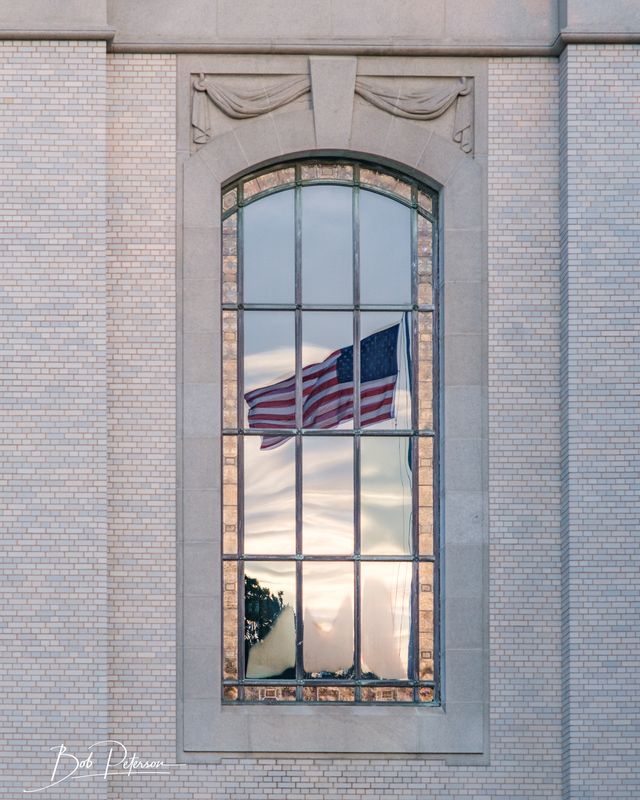 Flag Reflection in Chapel Window