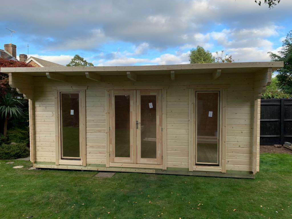 side view of Blake log cabin
