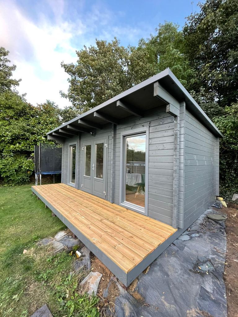 side view of Brown log cabin