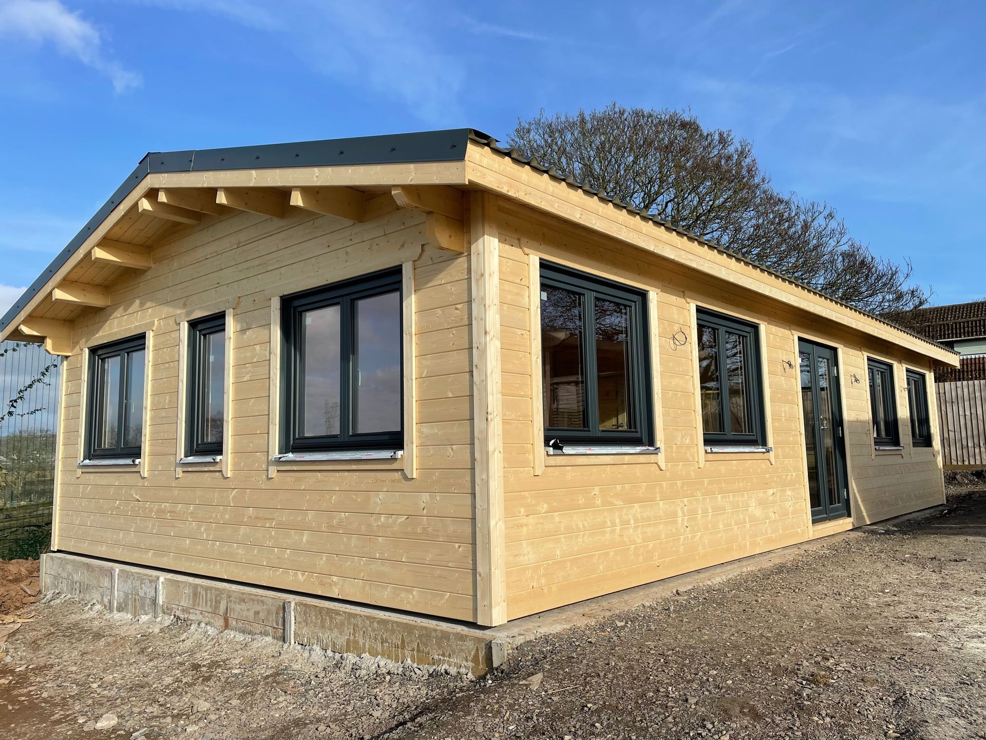Canterbury 2 Bedroom Fully Insulated Log Cabin | 68mm Logs + 100mm Insulation + 28mm Cladding | 11.2 x 6.2m | Bespoke Range | Winter Pack Included