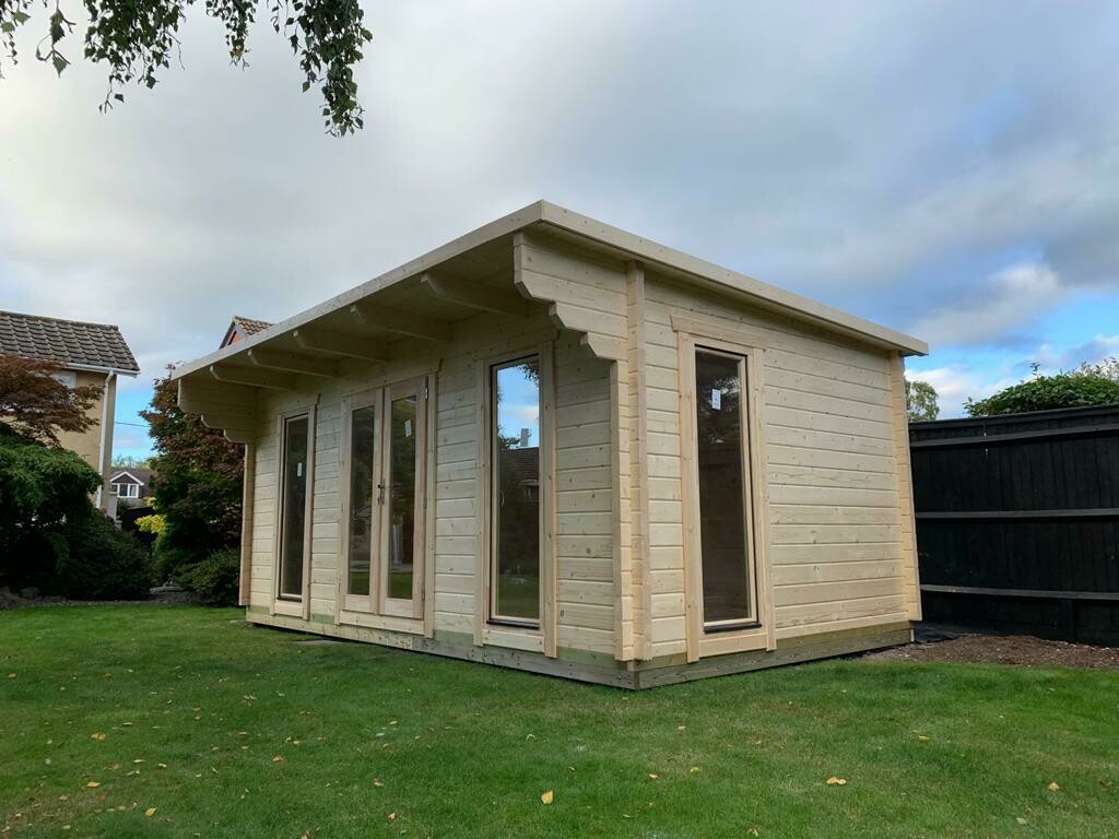 Blake Log Cabin | 44 or 68mm Logs | 5.8 x 3.3m | Bespoke Range side view of Blake log cabin