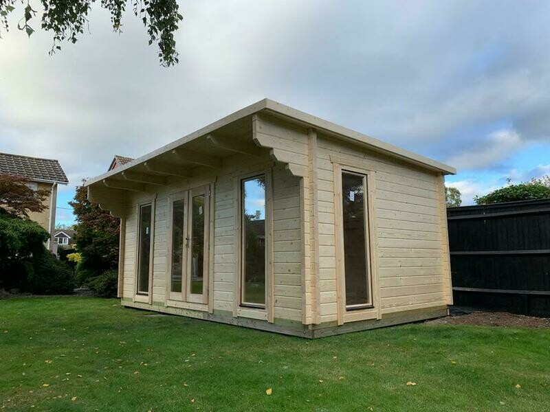 Blake Log Cabin | 44 or 68mm Logs | 5.8 x 3.3m | Bespoke Range side view of Blake log cabin
