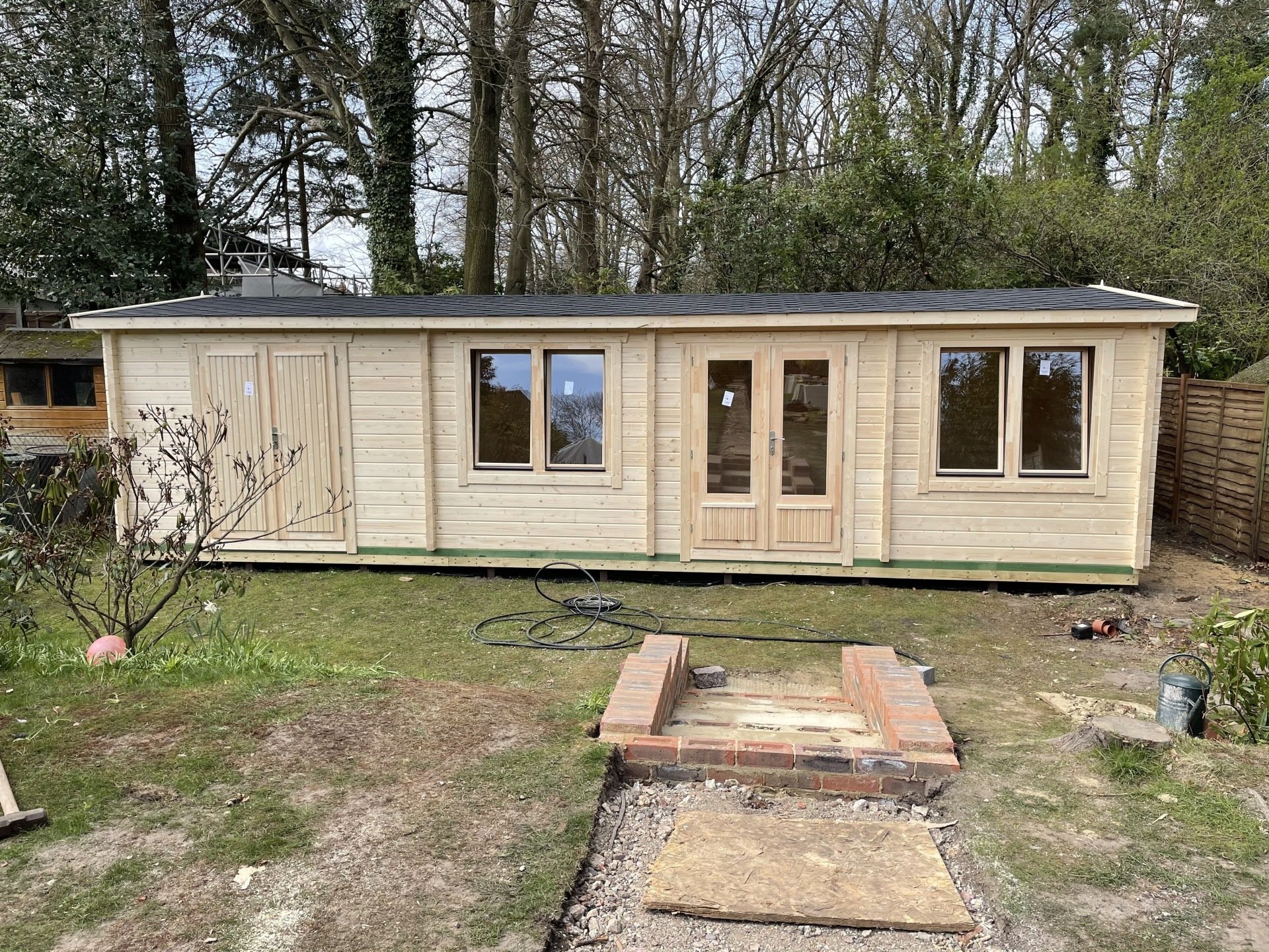 front view of Carr log cabin