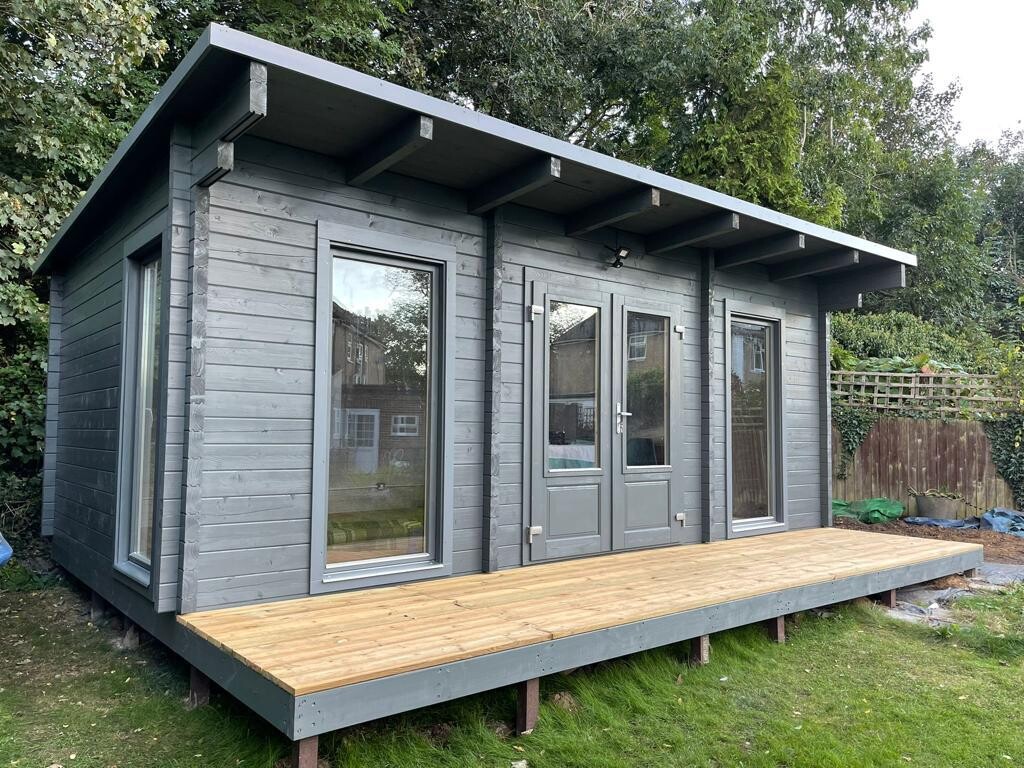 side view of Brown log cabin