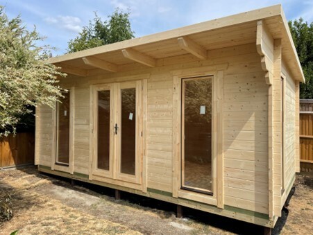 side view of Blakey log cabin