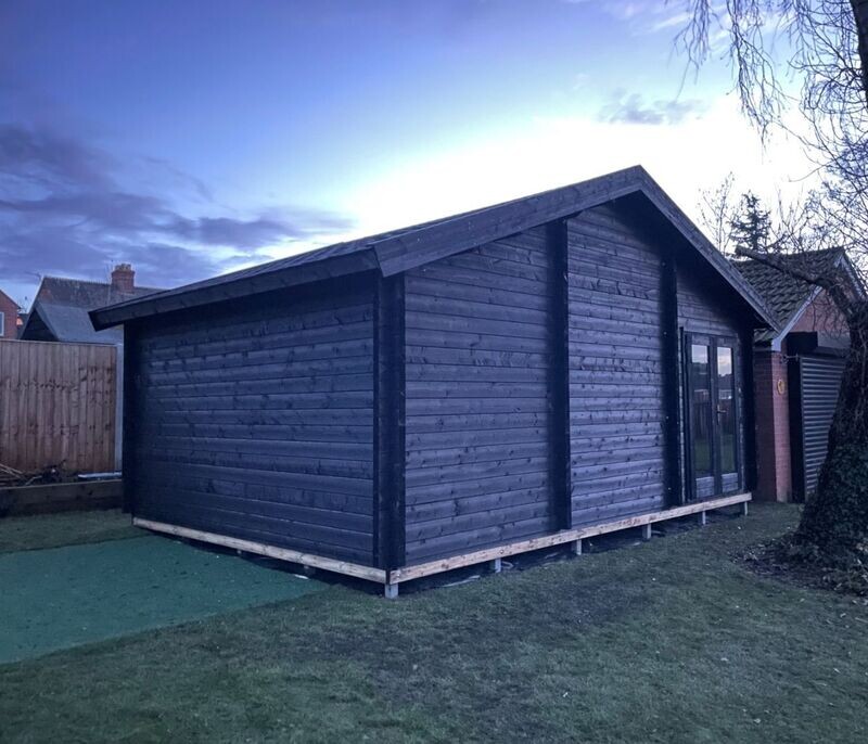 The Divot Golf Cabin | 6.0 x 4.5m (Internal) - Golf Simulator Log Cabin | 44mm or 68mm Thick Logs | BESPOKE The Divot Golf Cabin | 6.0 x 4.5m (Internal) - Golf Simulator Log Cabin | 44mm or 68mm Thick Logs | BESPOKE