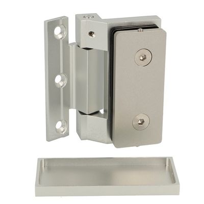 Anodēta stikla durvju eņģe KIEV, siena/stikls, ar dekoratīvām uzlikām, piemērota 6-10 mm stiklam. Max. noslodze 36 kg pārim