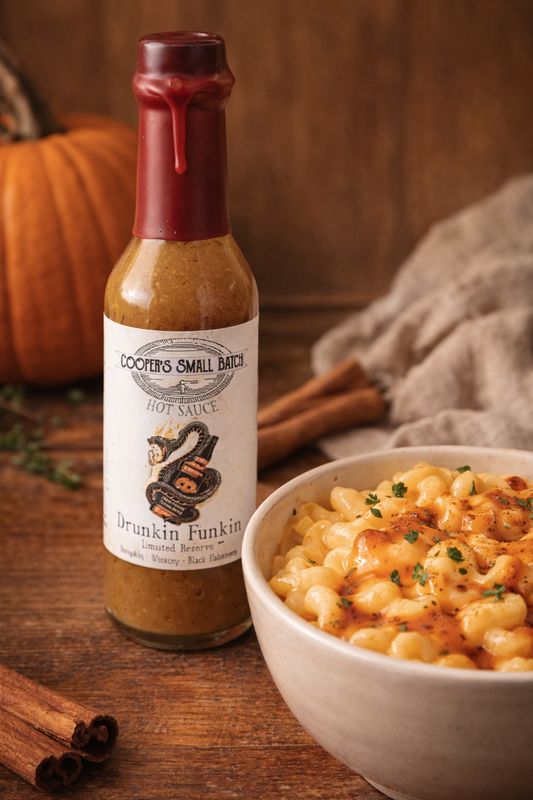 Bourbon pumpkin hot sauce on mac and cheese with fall spices – Drunkin Funkin by Cooper’s Small Batch
