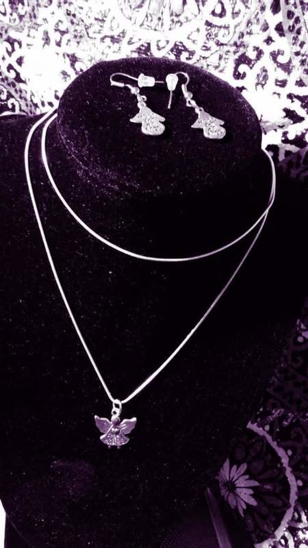 Sterling silver 30 inch Sterling silver chain with Angel charm and Angel ear rings for the ladies!