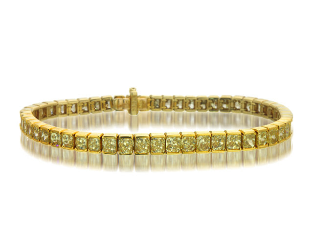 18K Y/G DIAMOND BRACELET DIAS=12.24CTS
