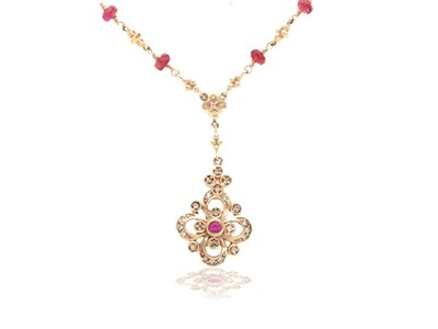 14K rose gold pink sapphire and diamond necklace.