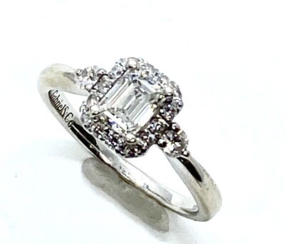 Designer Engagement Ring with emerald cut Diamond