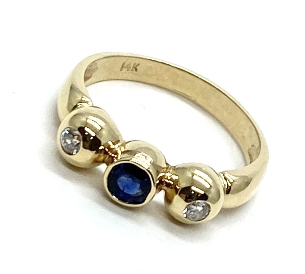 Blue Sapphire and Diamond 3-stone Ring