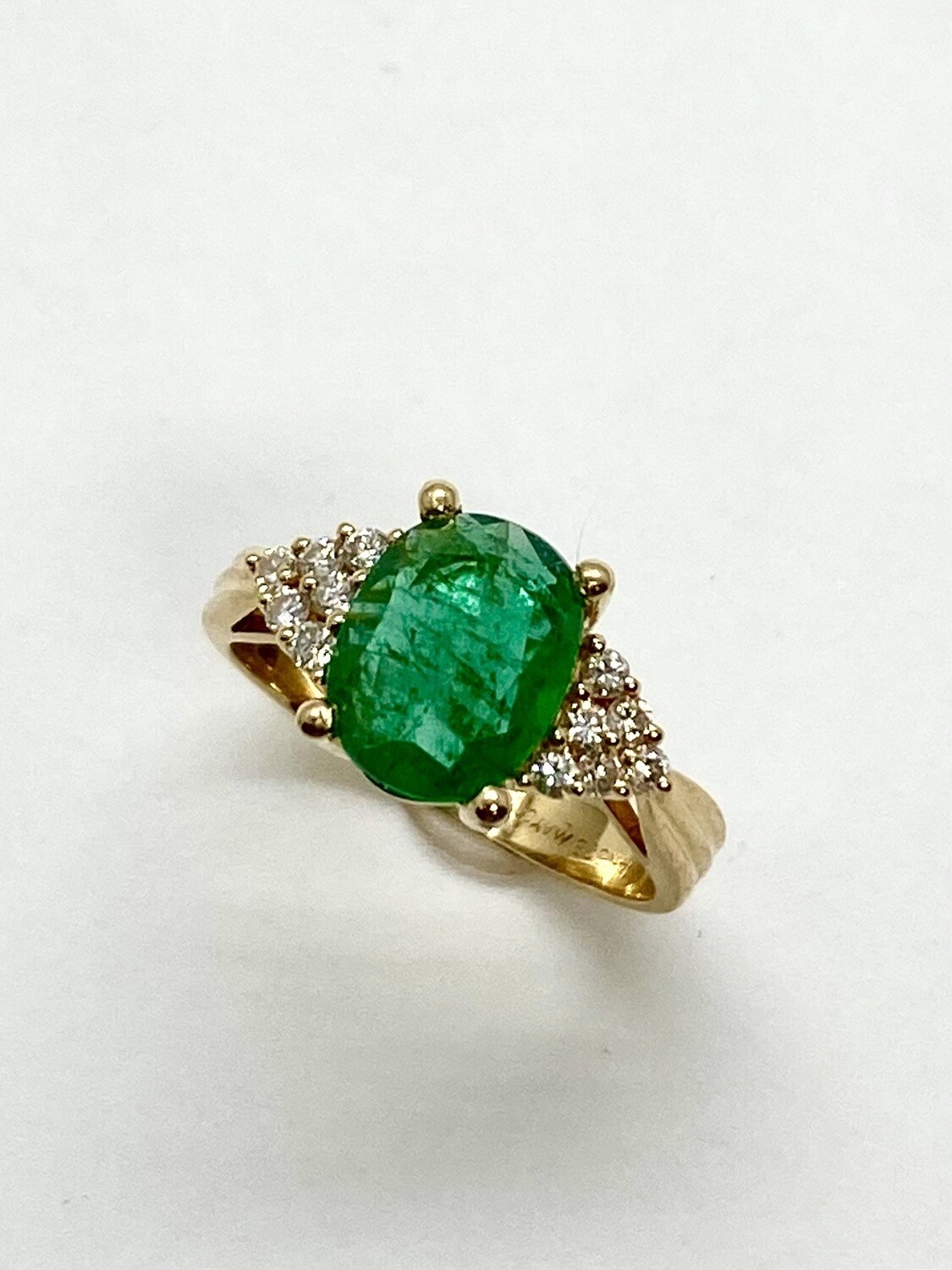 Oval Emerald and Diamond Ring