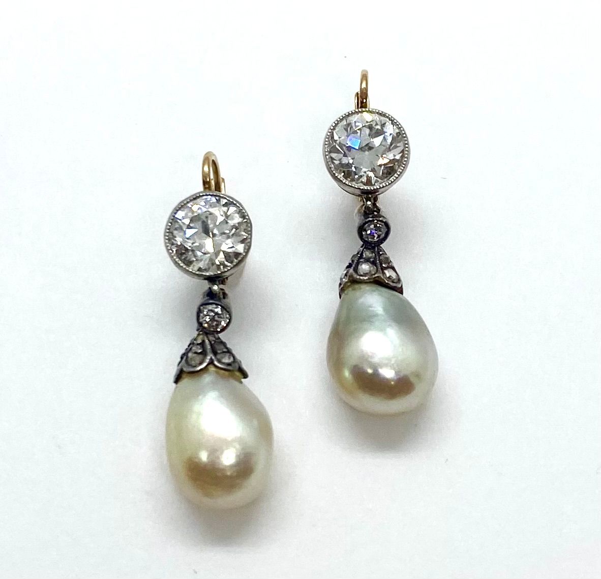 Natural Pearls and Diamonds Earrings in Platinum
