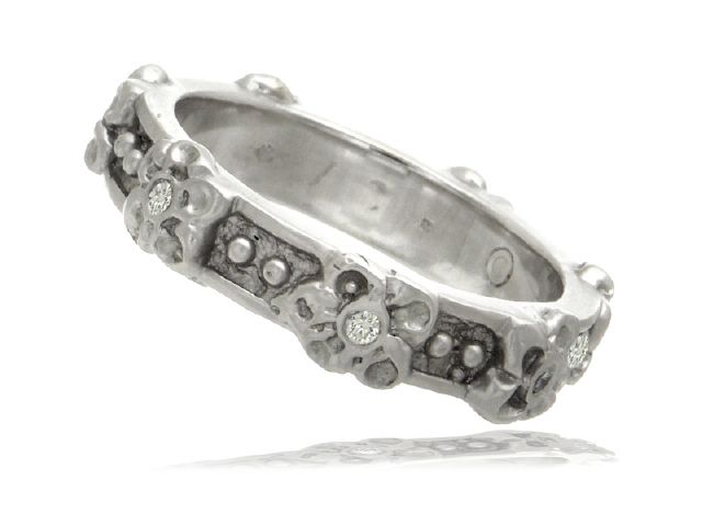 18KW DIA..10CT FLOWER MOTIF BAND RING