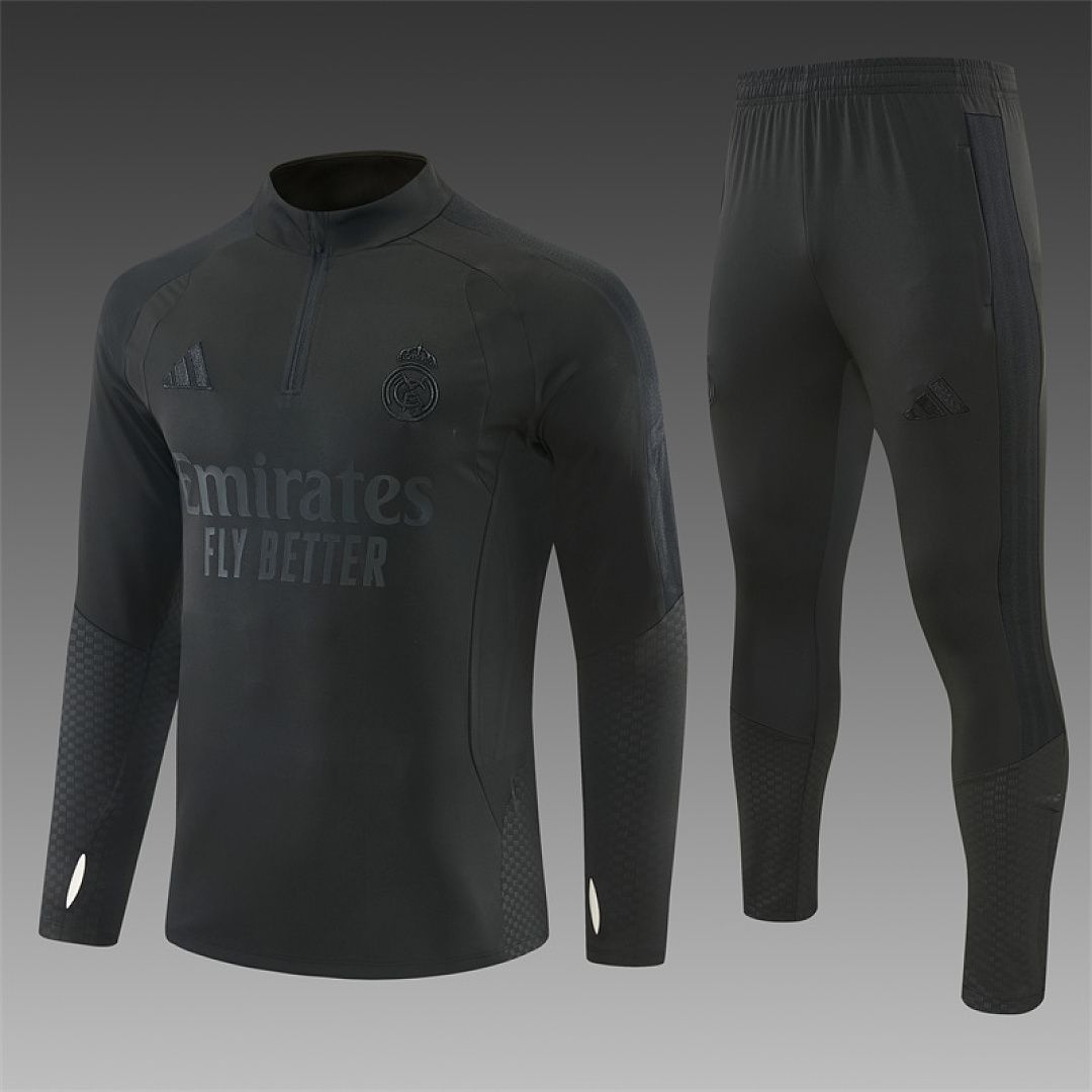 Conjunto Real Madrid 2026/27 Blusão e Calça - Treino Masculino Black Meio Zíper Conjunto Real Madrid 2026/27 Blusão e Calça - Treino Masculino Black Meio Zíper