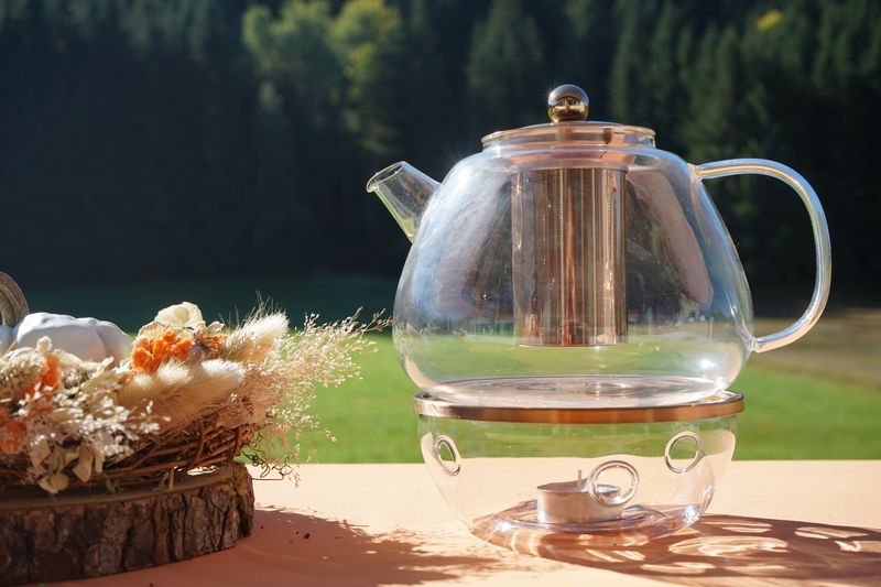 Teekanne mit Stövchen