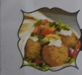 FALAFEL (Végétarien) boulettes de légumes avec salade, persil, oignon, tomate, cornichon et sauce tahini