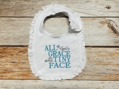 White Ruffle Bib -  "All of God's Grace in one Tiny Face"