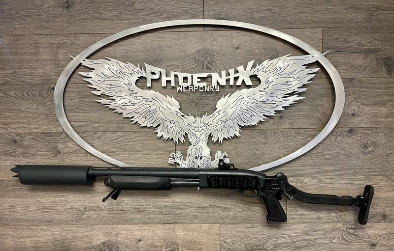 Karen Integrally Suppressed 12-Gauge Shotgun. Karen Integrally Suppressed 12-Gauge Shotgun.