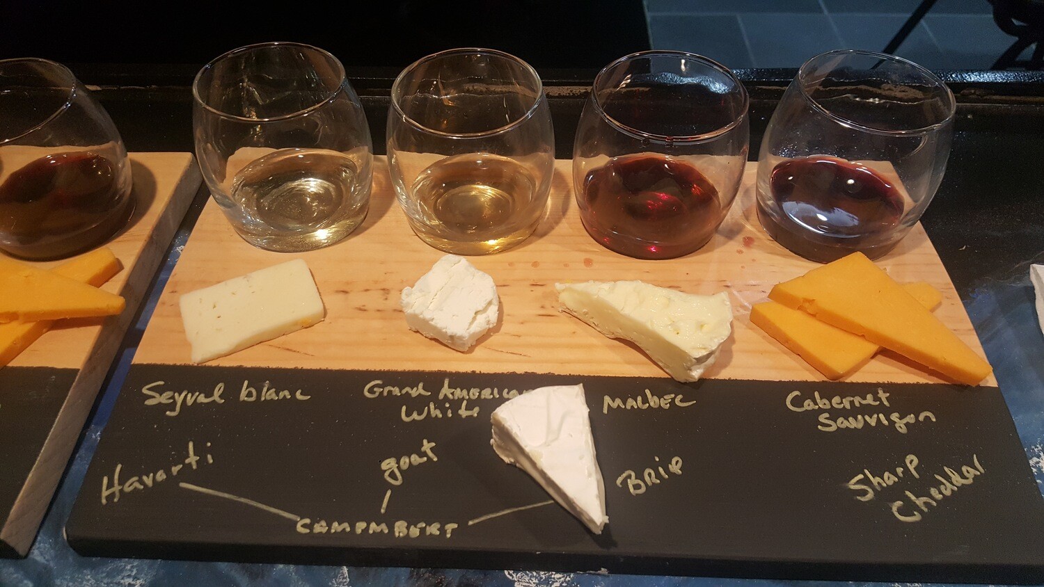 Wine flight w/ cheese pairing (four)