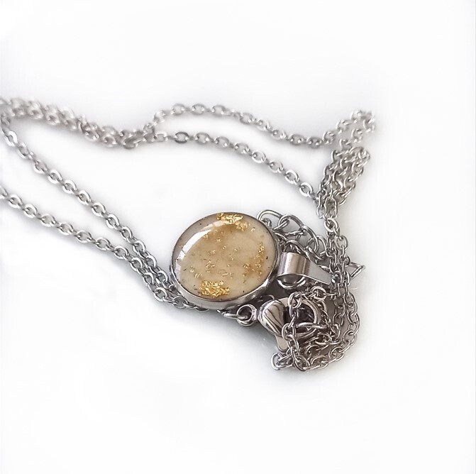 Necklace with breast milk, baby hair &amp; gold leaf pendant