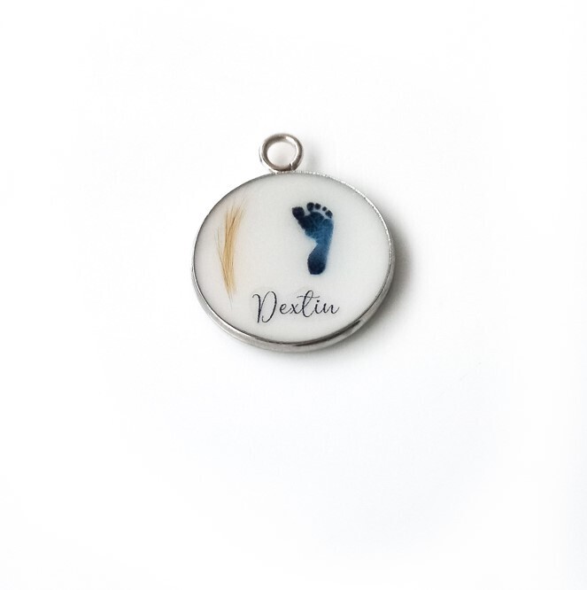 Breast milk, baby hair, footprint and name pendant.