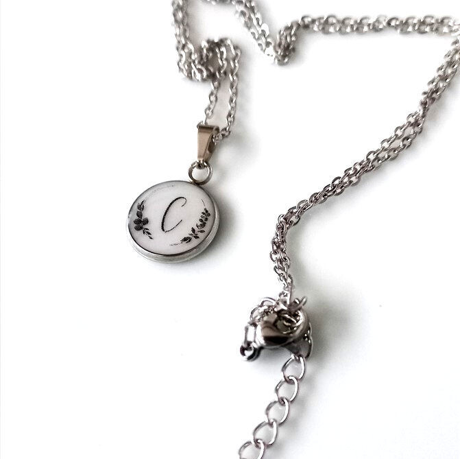 Necklace with breast milk &amp; a floral initial pendant