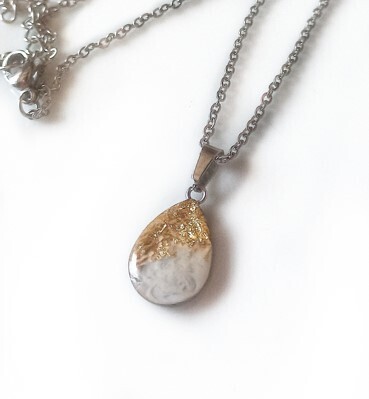 Necklace with breast milk drop pendant with gold leaf pieces